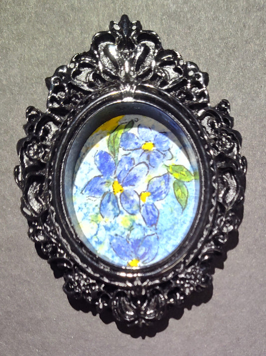 Forget-me-nots in Black Oval frame by Dominique LaVoie
