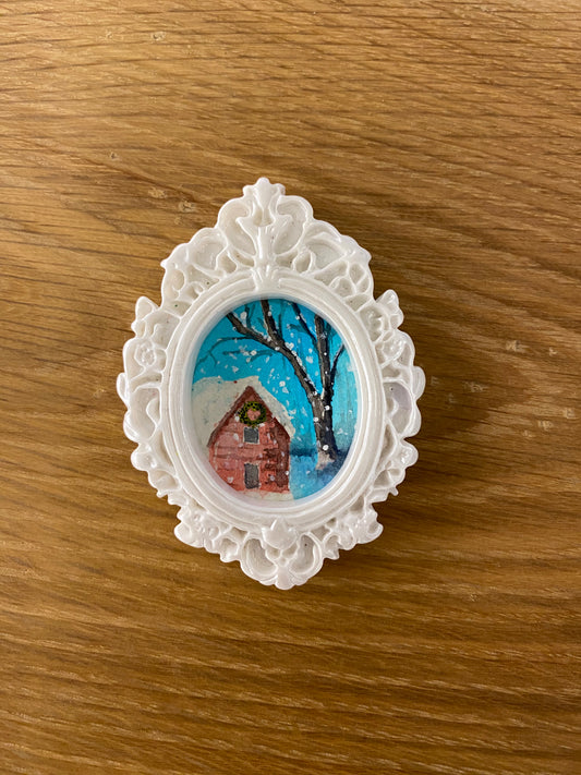 Red Barn with Wreath in White Oval Frame by Dominique LaVoie