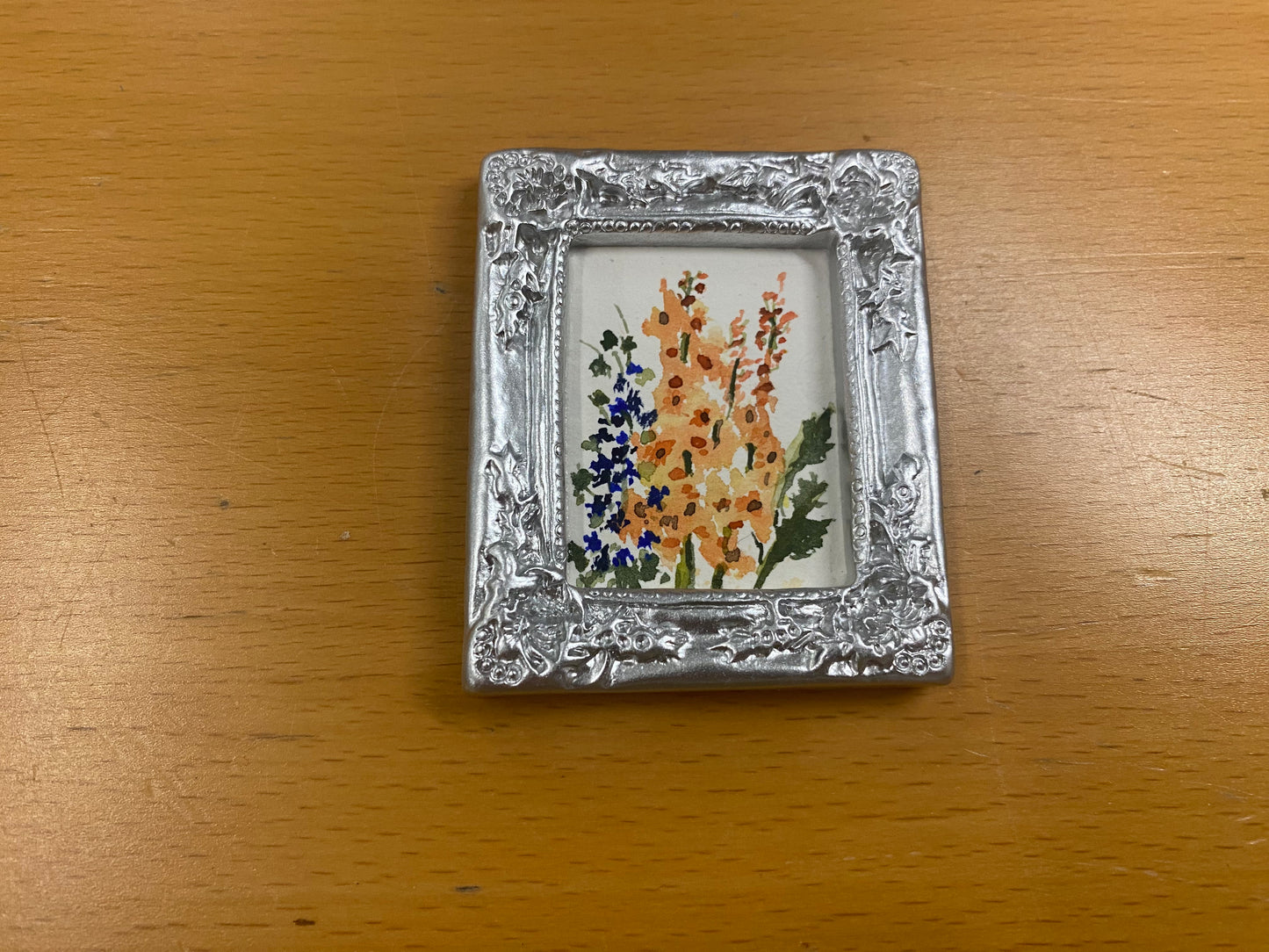 Silver Frame with Orange Flowers by Dominique LaVoie